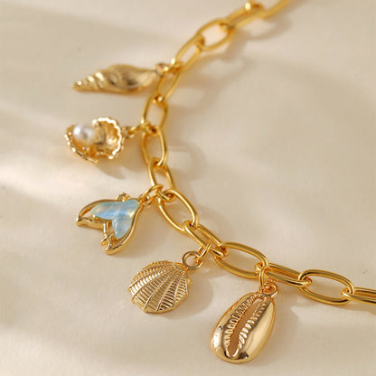 Pulsera con dije de cobre con baño de oro de 18 quilates