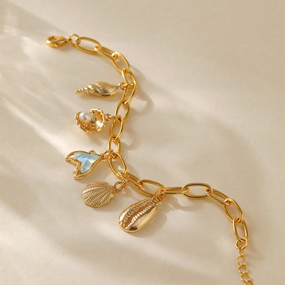 Pulsera con dije de cobre con baño de oro de 18 quilates