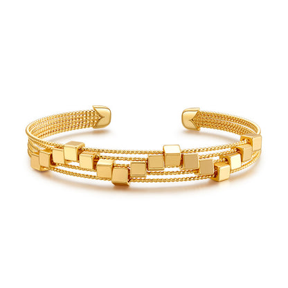 Brazalete chapado en oro delicado