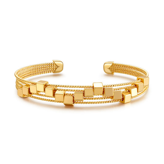 Brazalete chapado en oro delicado